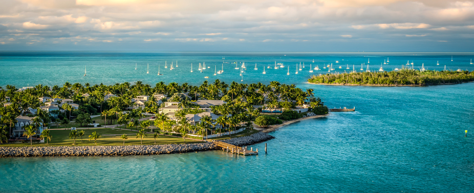 Panoramic sunrise landscape view of the small Islands Sunset Key and Wisteria Island of the Island of Key West, Florida Keys.